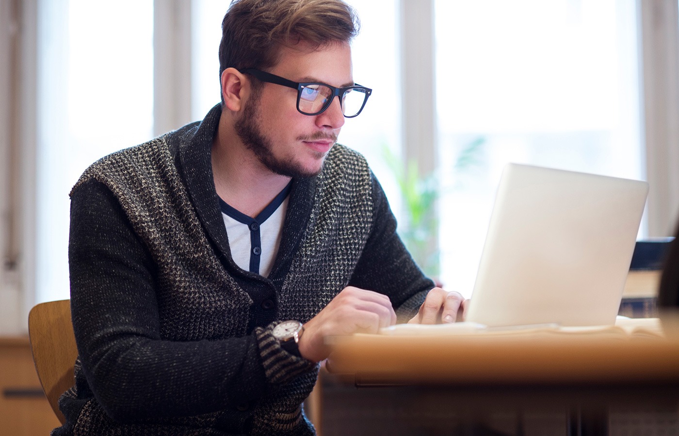 Male student on laptop